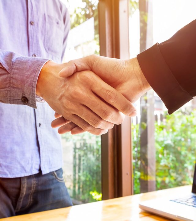 two-business-men-shaking-hands_Easy-Resize.com